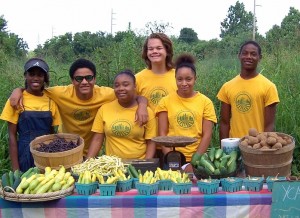 2013 Crew Members selling produce from their field at the Community Meal